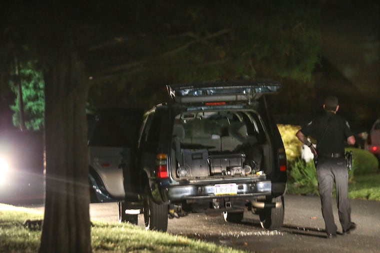 Police hold the scene after a man wanted for an attempted homicide in Delaware County allegedly shot at police in Southwest Philadelphia and stole an unmarked police SUV, then abandoned the vehicle here in Deptford, N.J., Monday, August 23, 2021.