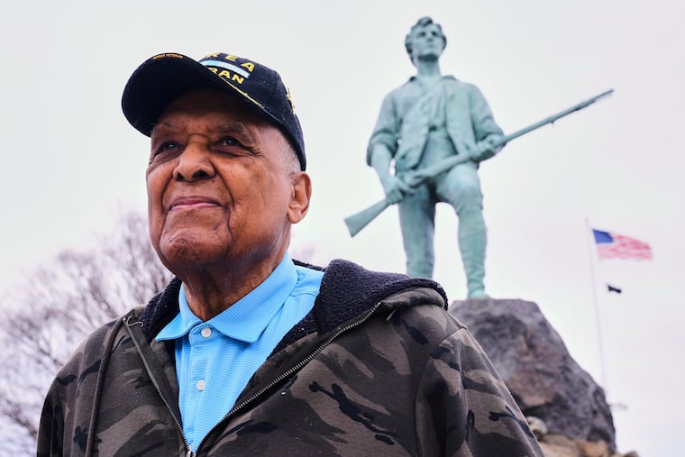 Revolutionary War re-enactor Charles Price, 95, who for decades portrayed enslaved Minuteman Prince Estabrook, poses for a portrait near the Minute Man statue, Monday, April 13, 2026, in Lexington, Mass. (AP Photo/Charles Krupa)