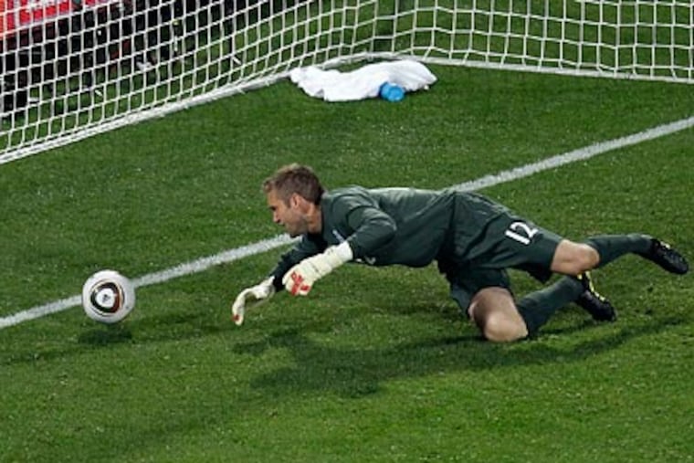 England goalkeeper Robert Green was skewered by the press back home for his blunder. (Michael Sohn/AP)