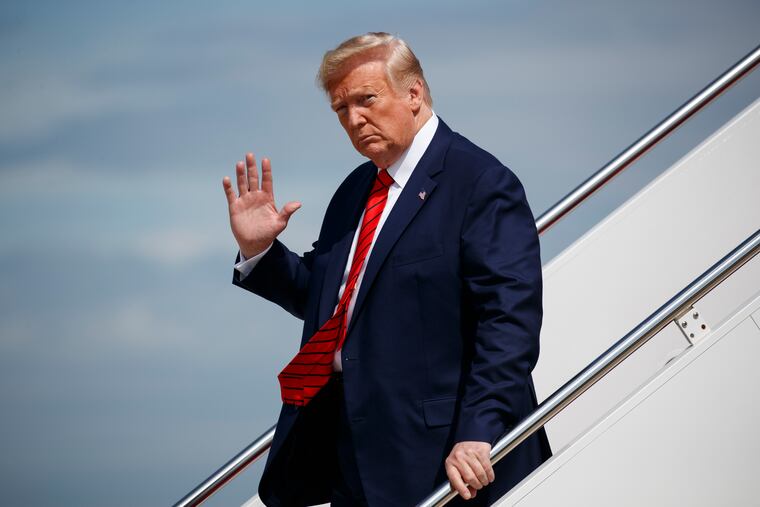 In this Sept. 26, 2019 photo, President Donald Trump waves to reporters as he steps off Air Force One after arriving at Andrews Air Force Base, in Andrews Air Force Base, Md. A whistle blew, an impeachment inquiry swung into motion and the president at the center of it all rose defiantly to his own defense, not always in command of the facts. (AP Photo/Evan Vucci)
