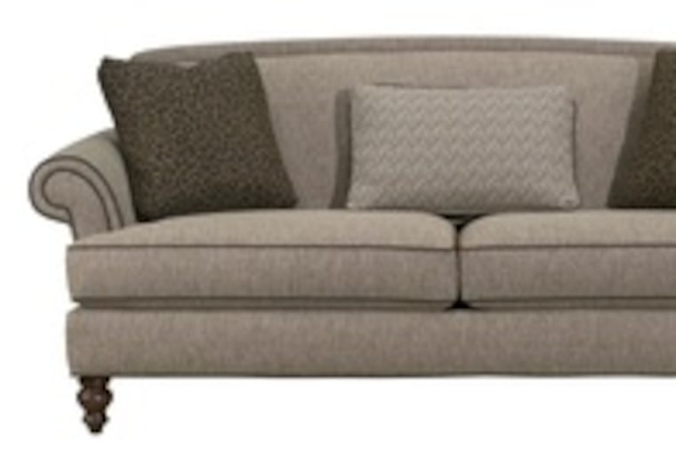 There are many ways to make a sofa that you don't like look better.