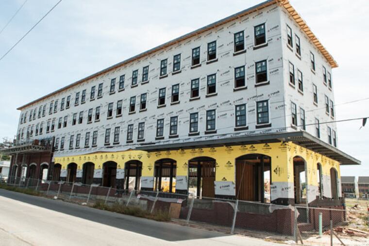 Victory Beer plans to open a brewpub on West Cypress Street in Kennett Square. Still under construction, the brewpub will occupy the street level of a mixed-use building. (Matthew Hall / Staff Photographer)