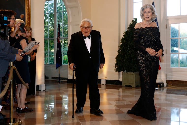 Former Secretary of State Henry Kissinger, left, and wife Nancy Kissinger arrive for a State Dinner with Australian Prime Minister Scott Morrison and President Donald Trump at the White House, Friday, Sept. 20, 2019, in Washington.