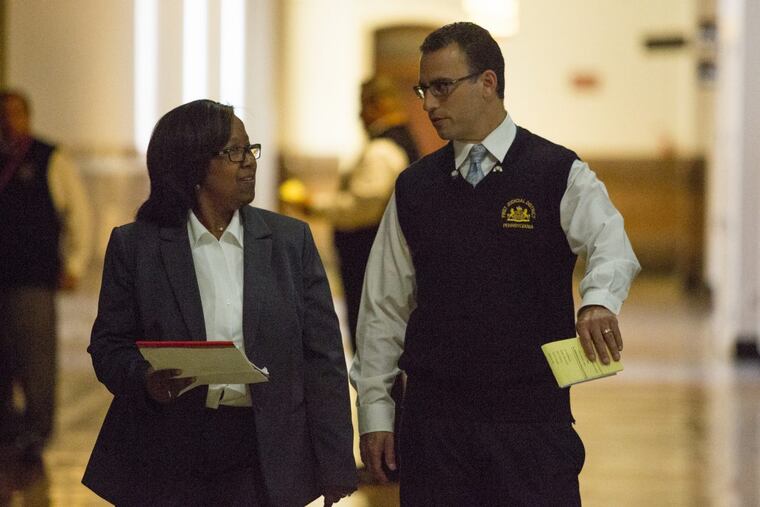 Kelley Hodge walks to give her pitch for interim district attorney in City Hall July 19, 2017.