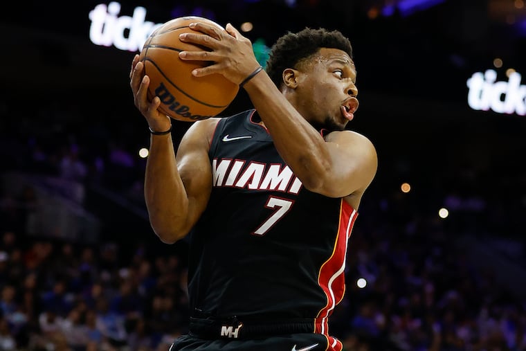 Miami Heat guard Kyle Lowry grabs the basketball against the Sixers on Monday, March 21, 2022 in Philadelphia.