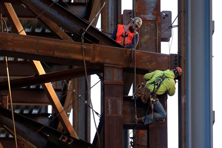 Ironworkers help to build the new Comcast Innovation and Technology Center in Philadelphia.