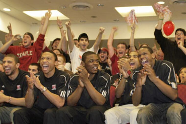 Temple men's basketball team members and supporters rejoice after learning the Owls will play Arizona State in the first round of the NCAA basketball tournament on Sunday. (Yong Kim / Staff Photographer)