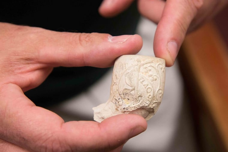 A tobacco pipe with Irish markings currently on display at display at Immaculata University Library exhibit about the Duffy’s Cut victims, 57 Irish railway workers that were victims of cholera and violence.