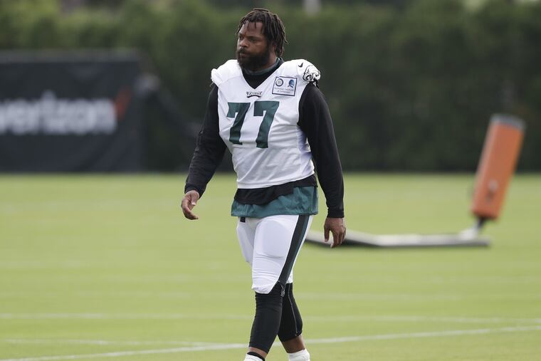 Eagles defensive linemen Michael Bennett walks the field during training camp at the NovaCare Complex in South Philadelphia on Saturday, July 28, 2018. YONG KIM / Staff Photographer