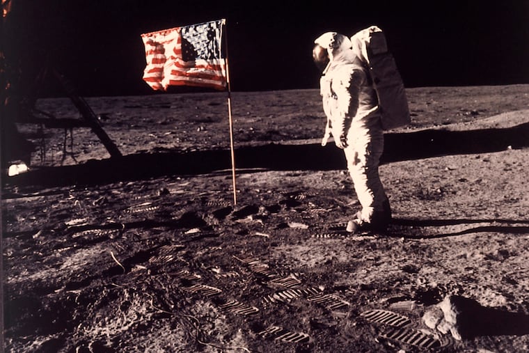 Astronaut Buzz Aldrin poses for a photograph beside the U.S. flag deployed on the moon during the Apollo 11 mission on July 20, 1969.