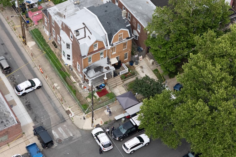 Investigators search the home of Eugene Albert Horsch on West Chew Avenue (grey roof) in the Onley section of Philadelphia on Friday, June 26, 2026.