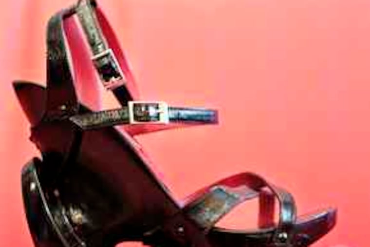 Stacked heels are so 20th century. Romania's "shoe architect," Mihai Albu, builds his skyscraper shoes to the dizzying height of 12 inches. They go for as much as $1,525.