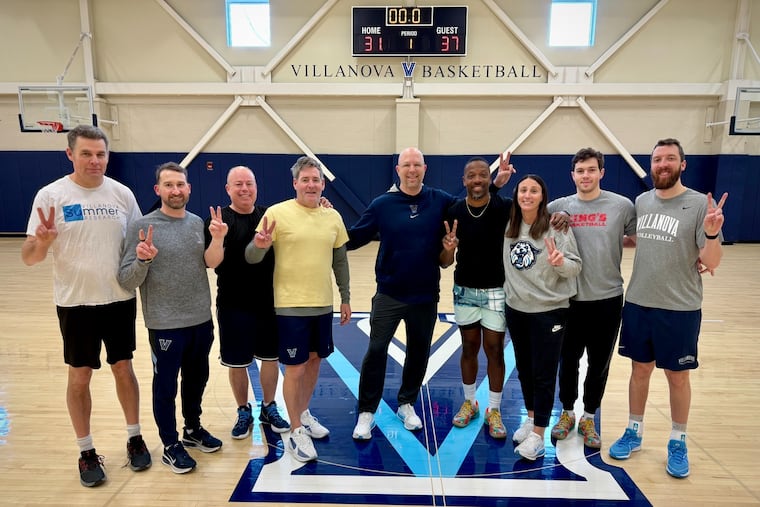 Josh Steinbach (middle) with Villanova's athletic training staff who helped save his life.