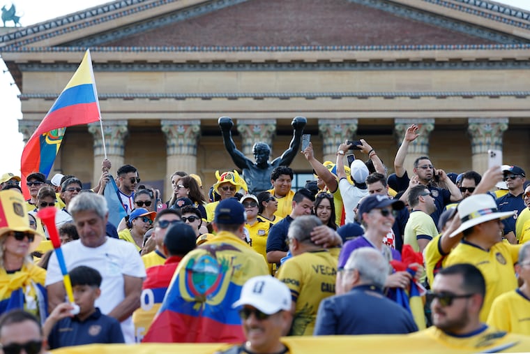Ecuadorian soccer fans attend a flag-waving event at the Philadelphia Museum of Art steps along the Benjamin Franklin Parkway ahead of their first round World Cup match against Côte d’Ivoire on Saturday.
