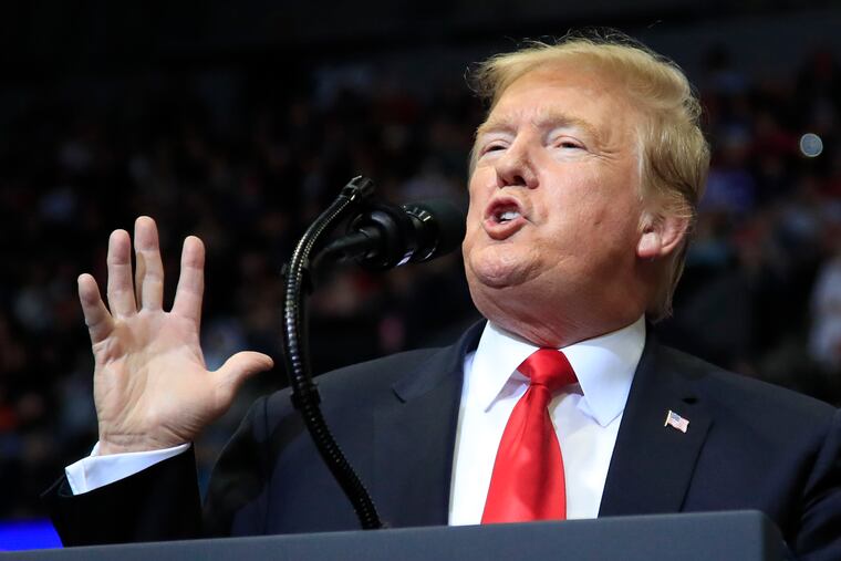 In this March 28, 2019 photo, President Donald Trump speaks at a campaign rally in Grand Rapids, Mich. Trump is suggesting he will defer until after 2020 his push for a Republican health care plan to replace the Affordable Care Act. Trump tweeted late Monday that Congress will vote on a GOP plan after the elections, ”when Republicans hold the Senate & win back the House.”