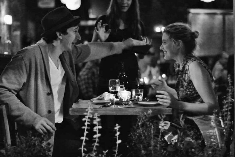 Frances (Greta Gerwig) dines with Lev (Adam Driver), with whom she shares an apartment while waiting for her career to take off.
