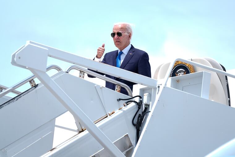 President Joe Biden boarding Air Force One in Dover, Del. Tuesday. Biden will deliver a national address Wednesday after dropping out from the 2024 presidential race.