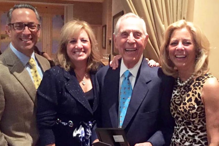 Mark Nicoletti, Donna Nicoletti Ferrier, Robert V. Nicoletti, and Lori Nicoletti Peruto in an undated family photograph.