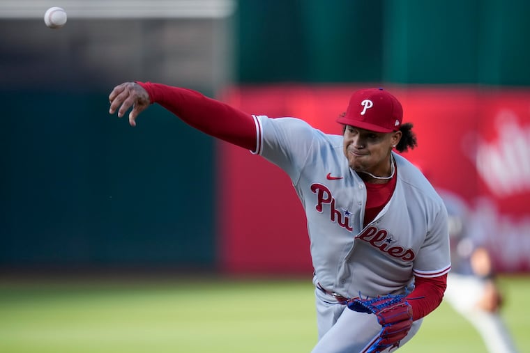 Phillies pitcher Taijuan Walker throws a pitch in the first inning against the Oakland A's. Walker allowed one run on seven hits and struck out eight over eight innings.