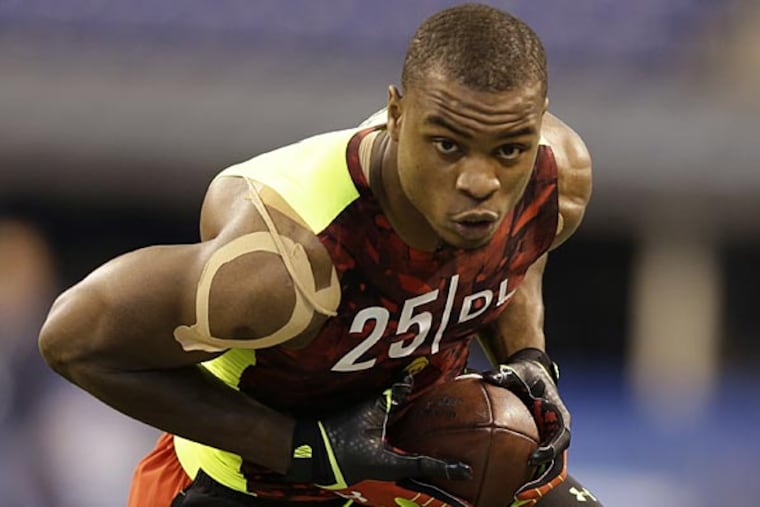 Oregon defensive lineman Dion Jordan runs a drill at the NFL football scouting combine in Indianapolis, Monday, Feb. 25, 2013. (Michael Conroy/AP)