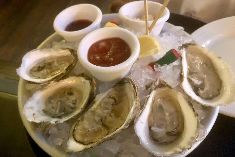 Six oysters for happy hour at P.J. Clarke's.