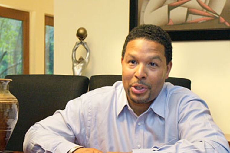 Otis Hackney III, picked by Arlene Ackerman, will take over as principal at South Philadelphia High on July 1. (Elizabeth Robertson / Staff Photographer)