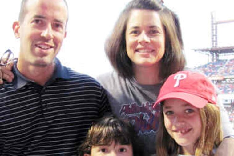 Everyone seems to be capitalizing on the Phils' success - the owners, the fans, the stations that carry the games, advertisers and vendors. Among the beneficiaries are John Corrado of Hatfield, whose boys, Dean and Christian (left), are modeling T-shirts of his, and Alexis Murray (right, with her husband and kids), who designs "P" necklaces.