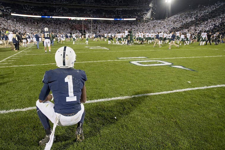 Penn State wide receiver KJ Hamler watches in disappointment as Michigan State celebrates a 21-17 win at Beaver Stadium in University Park, Pa., on Saturday, Oct. 13, 2018.