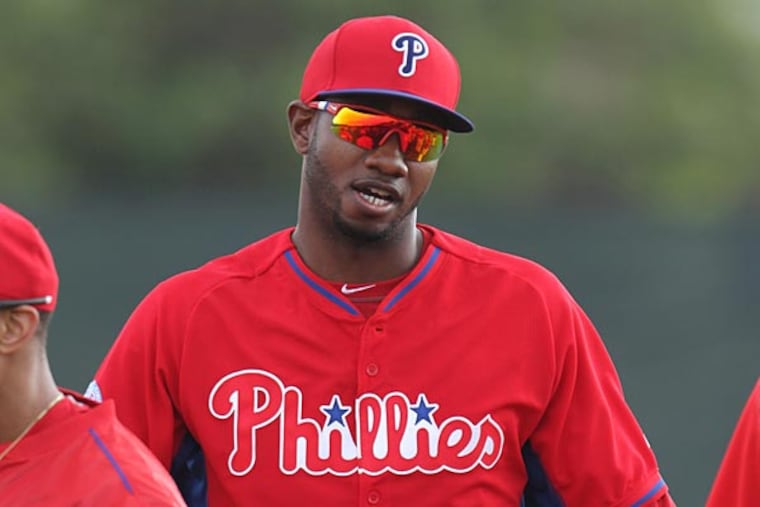 Domonic Brown dresses for practice. (David Swanson/Staff Photographer)