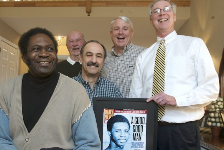 Members of Villanova's 1971 NCAA finalist team, in 2009: Clarence Smith (from left), assistant coach Dan Dougherty; Tom Ingelsby, Mike Daly, and Ed Hastings, with a photo of Howard Porter.