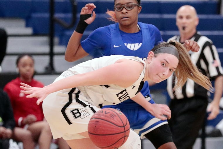 Westampton Tech’s Nisea Burrell (behind) and Bishop Eustace's Lauren Punk react to a loose ball.