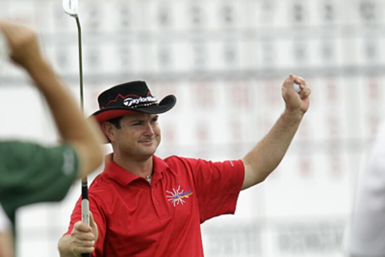 Rory Sabbatini celebrates after winning the Honda Classic golf tournament on Sunday. (AP Photo/J Pat Carter)