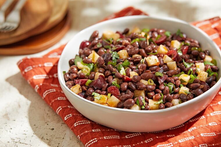 With seasonings bold enough to stand up to smoky, spiced meats but not so bold as to overpower a simply grilled fish fillet, this black bean salad with cherries makes an ideal side dish.