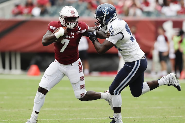 Temple running back Ryquell Armstead gets stopped by Villanova defensive lineman Malik Fisher during the first-quarter on Saturday, September 1, 2018. YONG KIM / Staff Photographer