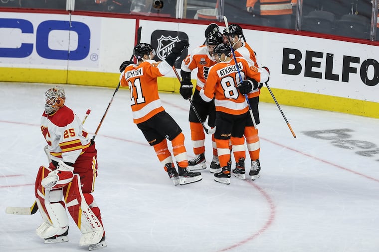 Cam Atkinson's overtime winner gave the Flyers a huge 2-1 win over the Flames in what was an emotional night all around.
