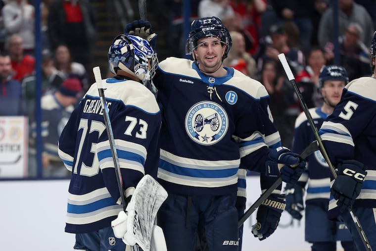Columbus Blue Jackets center Sean Monahan (right) was named the winner of the Bill Masterton Memorial Trophy.