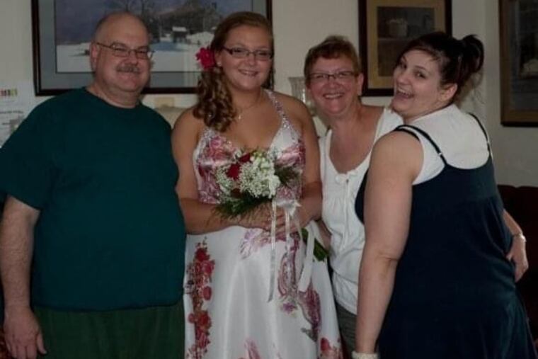 Mr. Griffith was always all smiles when he was with, left to right, daughter Megan, wife Joan, and daughter Courtney.