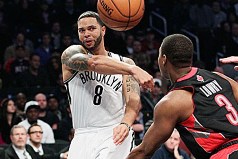 Nets guard Deron WIlliams score 19 points during the win over the Raptors. (Frank Franklin II)