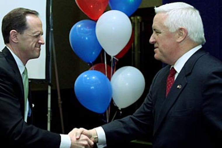 Tom Corbett, right, and Pat Toomey shake hands after accepting their endorsements during the Republican Party of Pennsylvania's Annual Winter Meeting in Harrisburg on Saturday. (AP Photo/Carolyn Kaster)