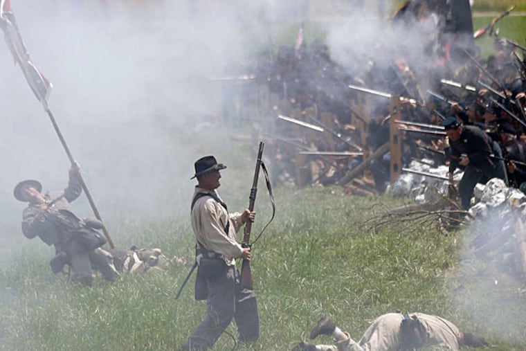 Thousands re-created Pickett's Charge Sunday in Gettysburg, the first of two huge reenactments planned this week. The three-day battle, a pivotal clash in the Civil War, marked the northernmost advance of Confederate forces. (AP)