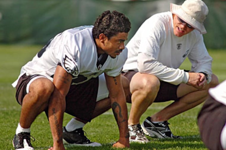Eagles rookie cornerback Macho Harris with defensive coordinator Sean McDermott in pre-season. ( Clem Murray / Staff Photographer )