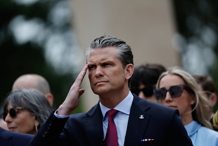 U.S. Defense Secretary Pete Hegseth salutes during a ceremony at the US cemetery to commemorate the 82nd anniversary of the D-Day, in Colleville-sur-Mer, Normandy, France, Saturday, June 6, 2026.
