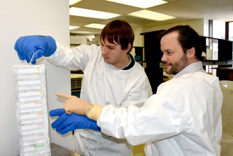 Luis J. Montaner (right) with Matthew Fair, a member of his lab at the Wistar Institute in 2018. The changing nature of scientific research and cuts to its funding require a different approach to training and practice, Montaner writes.