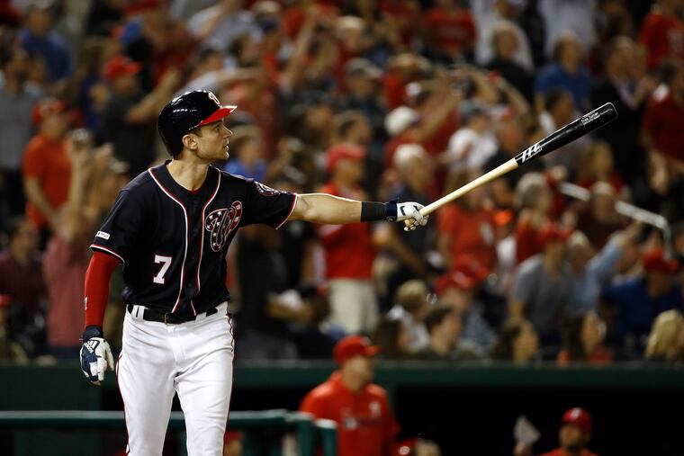 Washington's Trea Turner watches his grand slam in the sixth inning.