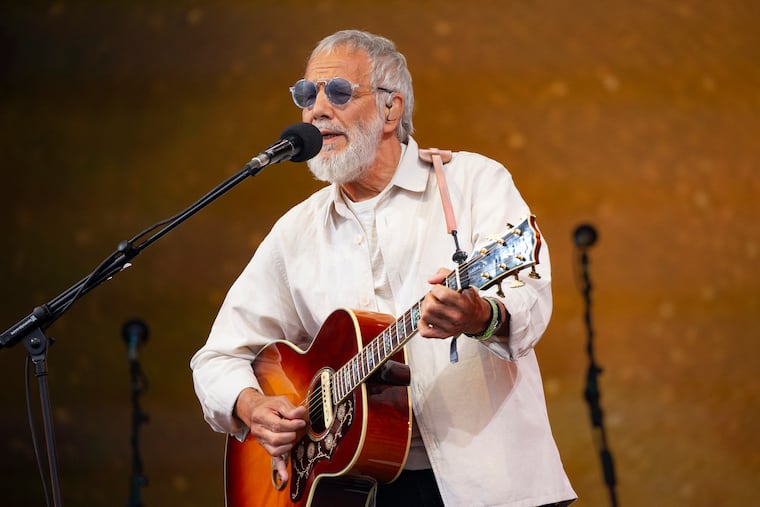 Yusuf Islam, known during his early musical career by his stage name Cat Stevens, performs during Glastonbury Festival in Worthy Farm, Somerset, England, Sunday, June 25, 2023. The opening date of his U.S. tour to promote his memoir "Cat on the Road to Findout" is supposed to be Oct. 2 in Philadelphia. (Joel C Ryan/Invision/AP, File)