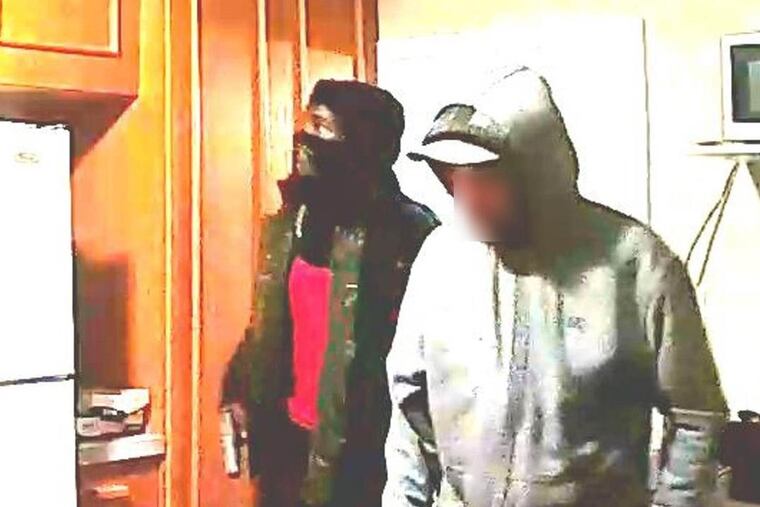A surveillance system picture of the suspects who authorities say shot Sylvia Williams, 38, of Pottstown, on the evening of Nov. 18 at her home on North Washington Street.