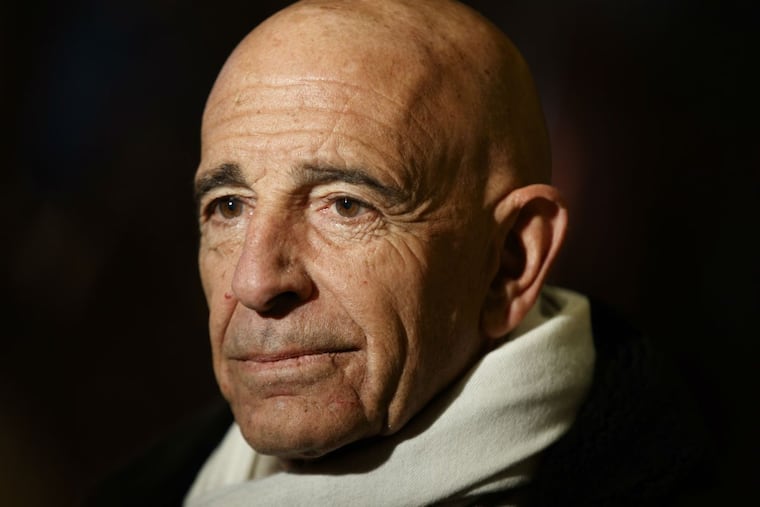 FILE – In this Jan. 10, 2017 file photo, Tom Barrack, chairman of the inaugural committee, speaks with reporters in the lobby of Trump Tower in New York. The Associated Press has learned that investigators working with special counsel Robert Mueller have interviewed Barrack. Two people familiar with the probe tell the AP that Barrack met with federal investigators working on the Russia inquiry. The people spoke on condition of anonymity to discuss private deliberations. Barrack spokesman Owen Blicksilver declined comment.