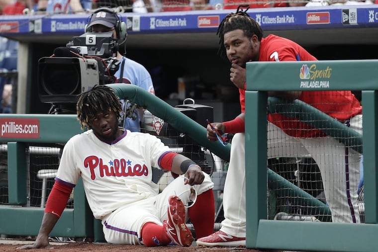 Should they stay or should they go? The Phillies face difficult decisions about whether to bring back center fielder Odubel Herrera (left) and third baseman Maikel Franco.