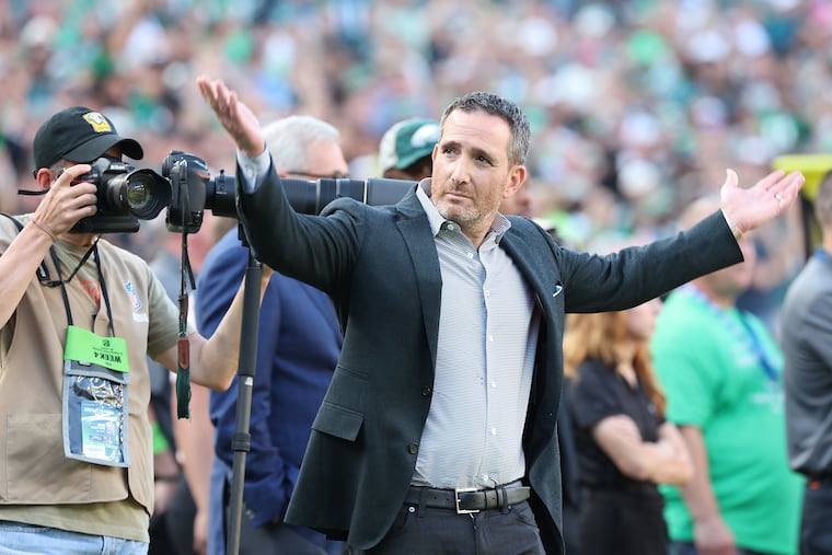 Eagles GM Howie Roseman encourages the fans to make noise during the game against the Commanders on Oct. 1.