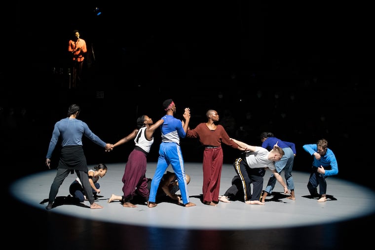 "Deep Blue Sea," conceived and directed by Bill T. Jones, is performed at the Mann Center on Friday by the Bill T. Jones/Arnie Zane Company. The performance involved the spoken word, dancers, a choir and projected images and light effects.